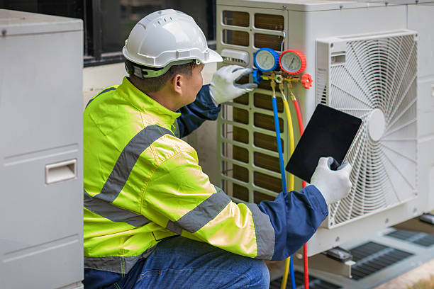 Professional Air Conditioning Repair technician working in Poynor, TX
